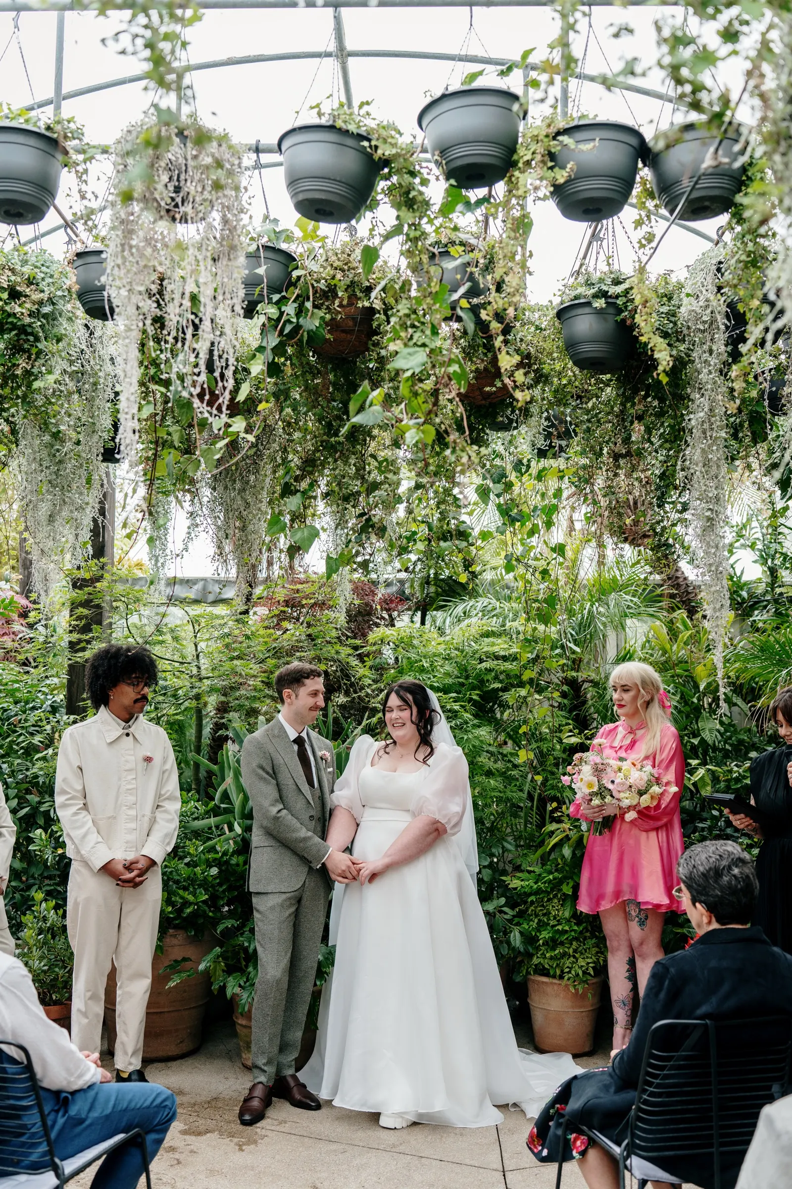 Family witnessing Stacie and Callum's wedding ceremony